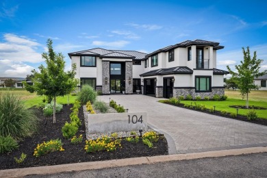 This dream home is nestled within the gated waterfront community on Legends Golf Course in Texas - for sale on GolfHomes.com, golf home, golf lot