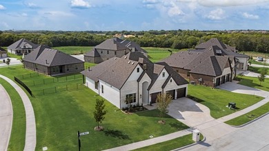 This highly sought-after single-story Altura Aspen floorplan is on Heath Golf and Yacht Club in Texas - for sale on GolfHomes.com, golf home, golf lot