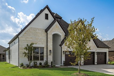 This highly sought-after single-story Altura Aspen floorplan is on Heath Golf and Yacht Club in Texas - for sale on GolfHomes.com, golf home, golf lot