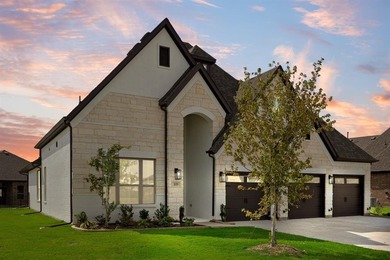This highly sought-after single-story Altura Aspen floorplan is on Heath Golf and Yacht Club in Texas - for sale on GolfHomes.com, golf home, golf lot