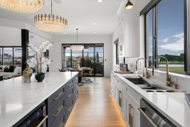This dream home is nestled within the gated waterfront community on Legends Golf Course in Texas - for sale on GolfHomes.com, golf home, golf lot