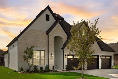 This highly sought-after single-story Altura Aspen floorplan is on Heath Golf and Yacht Club in Texas - for sale on GolfHomes.com, golf home, golf lot