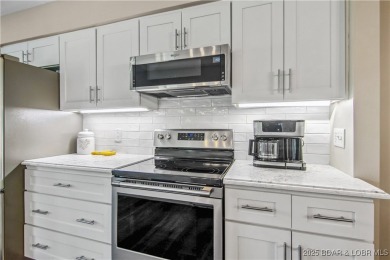 The location at Water's Edge that everyone wants. A walk in unit on Seasons Ridge At Four Seasons in Missouri - for sale on GolfHomes.com, golf home, golf lot