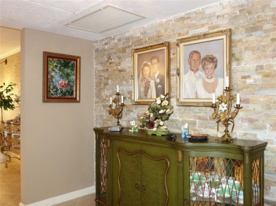 Highly sought-after *King* model with impact windows  accordion on Palm-Aire Country Club and Resort - Palms in Florida - for sale on GolfHomes.com, golf home, golf lot