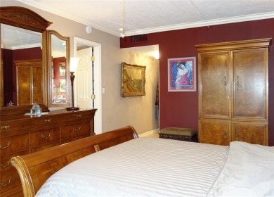 Highly sought-after *King* model with impact windows  accordion on Palm-Aire Country Club and Resort - Palms in Florida - for sale on GolfHomes.com, golf home, golf lot