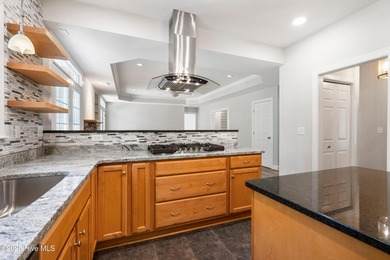 You don't want to miss this 5 bedroom, 3.5 bathroom Coastal on Belvedere Country Club in North Carolina - for sale on GolfHomes.com, golf home, golf lot