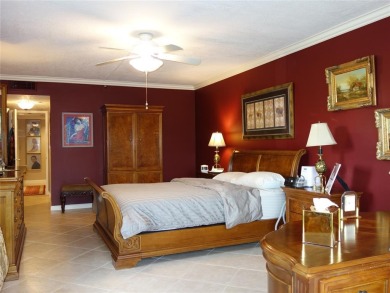 Highly sought-after *King* model with impact windows  accordion on Palm-Aire Country Club and Resort - Palms in Florida - for sale on GolfHomes.com, golf home, golf lot