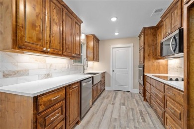 Newly remodeled three bedroom, two bathroom brick home in a on Legends Country Club in Texas - for sale on GolfHomes.com, golf home, golf lot
