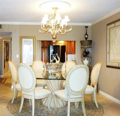 Highly sought-after *King* model with impact windows  accordion on Palm-Aire Country Club and Resort - Palms in Florida - for sale on GolfHomes.com, golf home, golf lot