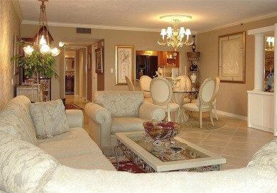 Highly sought-after *King* model with impact windows  accordion on Palm-Aire Country Club and Resort - Palms in Florida - for sale on GolfHomes.com, golf home, golf lot