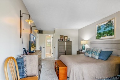 The location at Water's Edge that everyone wants. A walk in unit on Seasons Ridge At Four Seasons in Missouri - for sale on GolfHomes.com, golf home, golf lot