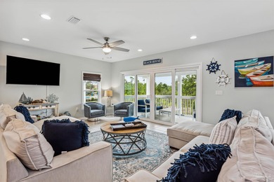 Discover effortless coastal living in this beautifully furnished on Lost Key Golf Club in Florida - for sale on GolfHomes.com, golf home, golf lot