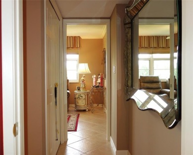 Highly sought-after *King* model with impact windows  accordion on Palm-Aire Country Club and Resort - Palms in Florida - for sale on GolfHomes.com, golf home, golf lot