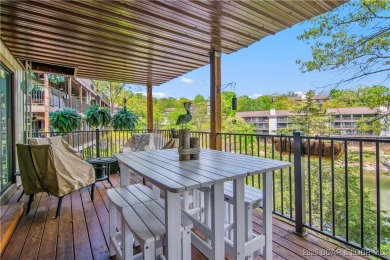 The location at Water's Edge that everyone wants. A walk in unit on Seasons Ridge At Four Seasons in Missouri - for sale on GolfHomes.com, golf home, golf lot
