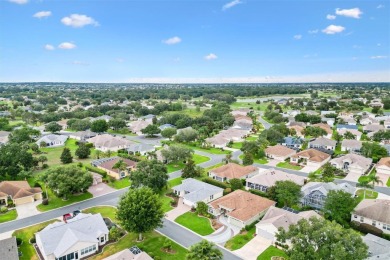 CORNER LOT IN THE VILLAGE OF SUNSET POINTE. This beautifully on The Links of Spruce Creek in Florida - for sale on GolfHomes.com, golf home, golf lot