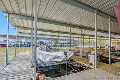 The location at Water's Edge that everyone wants. A walk in unit on Seasons Ridge At Four Seasons in Missouri - for sale on GolfHomes.com, golf home, golf lot