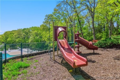 The location at Water's Edge that everyone wants. A walk in unit on Seasons Ridge At Four Seasons in Missouri - for sale on GolfHomes.com, golf home, golf lot