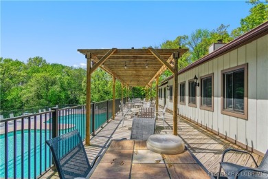 The location at Water's Edge that everyone wants. A walk in unit on Seasons Ridge At Four Seasons in Missouri - for sale on GolfHomes.com, golf home, golf lot