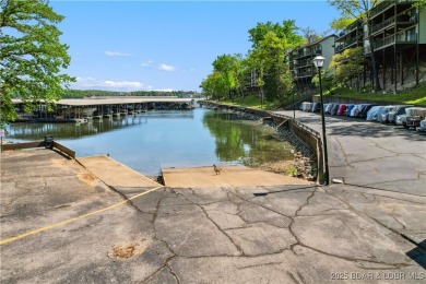 The location at Water's Edge that everyone wants. A walk in unit on Seasons Ridge At Four Seasons in Missouri - for sale on GolfHomes.com, golf home, golf lot