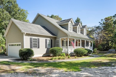 You don't want to miss this 5 bedroom, 3.5 bathroom Coastal on Belvedere Country Club in North Carolina - for sale on GolfHomes.com, golf home, golf lot