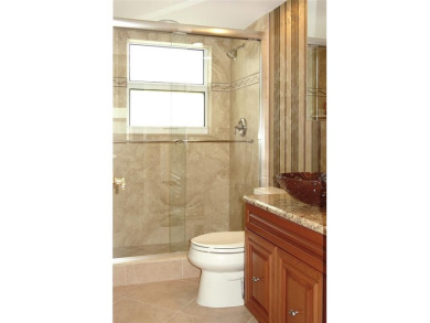 Highly sought-after *King* 1840 overall sqft model with impact on Palm-Aire Country Club and Resort - Palms in Florida - for sale on GolfHomes.com, golf home, golf lot