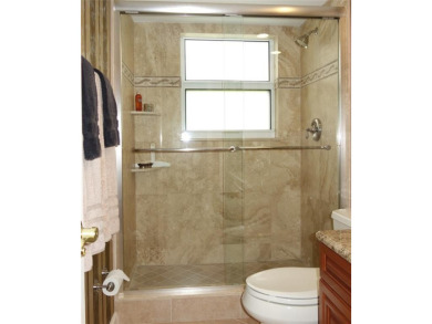 Highly sought-after *King* 1840 overall sqft model with impact on Palm-Aire Country Club and Resort - Palms in Florida - for sale on GolfHomes.com, golf home, golf lot