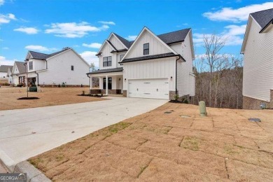 Welcome to the Travis floor plan - a thoughtfully designed 4 on The Plantation Golf Club in Georgia - for sale on GolfHomes.com, golf home, golf lot