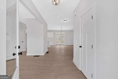 Welcome to the Travis floor plan - a thoughtfully designed 4 on The Plantation Golf Club in Georgia - for sale on GolfHomes.com, golf home, golf lot