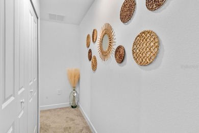 Unlock the door to luxury resort living and Central Florida on The Oasis Club at Champions Gate in Florida - for sale on GolfHomes.com, golf home, golf lot