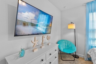 Unlock the door to luxury resort living and Central Florida on The Oasis Club at Champions Gate in Florida - for sale on GolfHomes.com, golf home, golf lot