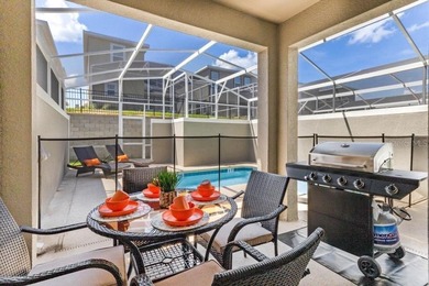 Unlock the door to luxury resort living and Central Florida on The Oasis Club at Champions Gate in Florida - for sale on GolfHomes.com, golf home, golf lot