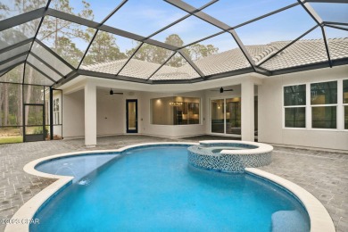 This incredible ARTHUR RUTENBERG built home is located inside on Holiday Golf Club - Regulation in Florida - for sale on GolfHomes.com, golf home, golf lot