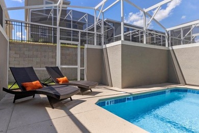 Unlock the door to luxury resort living and Central Florida on The Oasis Club at Champions Gate in Florida - for sale on GolfHomes.com, golf home, golf lot