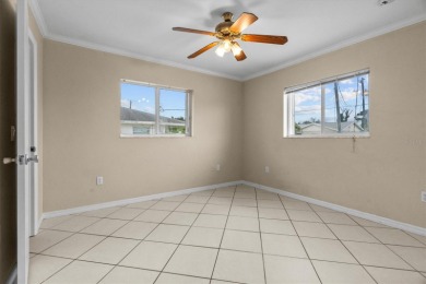 Investment Opportunity in Englewood! This 2003-built duplex at on Oyster Creek Golf Club in Florida - for sale on GolfHomes.com, golf home, golf lot