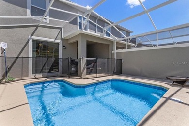 Unlock the door to luxury resort living and Central Florida on The Oasis Club at Champions Gate in Florida - for sale on GolfHomes.com, golf home, golf lot