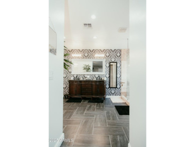 Looking for a semi-custom 2-story home located in an upscale on Dave White Reg Park and Golf Course in Arizona - for sale on GolfHomes.com, golf home, golf lot