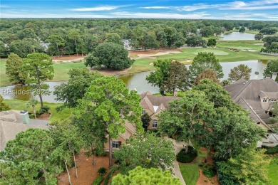 Classic 4 bedroom 3 1/2 bath Belfair home overlooking lagoon to on Belfair Golf Club in South Carolina - for sale on GolfHomes.com, golf home, golf lot