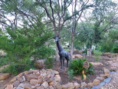 Tucked into a secluded cul-de-sac, this stunning half-acre on Slick Rock Golf Course - Horseshoe Bay in Texas - for sale on GolfHomes.com, golf home, golf lot