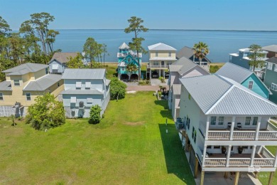 Build your dream coastal getaway in Bay Gardens-a charming and on Peninsula Golf and Racquet Club in Alabama - for sale on GolfHomes.com, golf home, golf lot