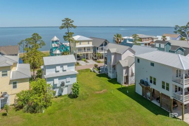 Build your dream coastal getaway in Bay Gardens-a charming and on Peninsula Golf and Racquet Club in Alabama - for sale on GolfHomes.com, golf home, golf lot