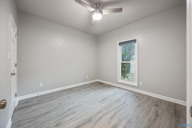 Welcome home to your single level, exceptionally built residence on Hampton Cove Golf Course in AL - for sale on GolfHomes.com, golf home, golf lot