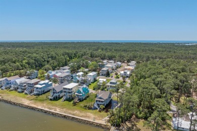 Build your dream coastal getaway in Bay Gardens-a charming and on Peninsula Golf and Racquet Club in Alabama - for sale on GolfHomes.com, golf home, golf lot