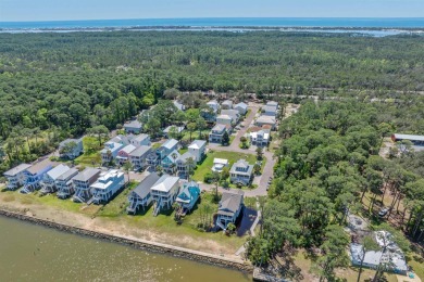 Build your dream coastal getaway in Bay Gardens-a charming and on Peninsula Golf and Racquet Club in Alabama - for sale on GolfHomes.com, golf home, golf lot