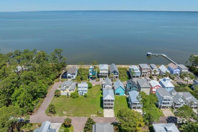 Build your dream coastal getaway in Bay Gardens-a charming and on Peninsula Golf and Racquet Club in Alabama - for sale on GolfHomes.com, golf home, golf lot