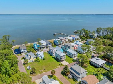 Build your dream coastal getaway in Bay Gardens-a charming and on Peninsula Golf and Racquet Club in Alabama - for sale on GolfHomes.com, golf home, golf lot