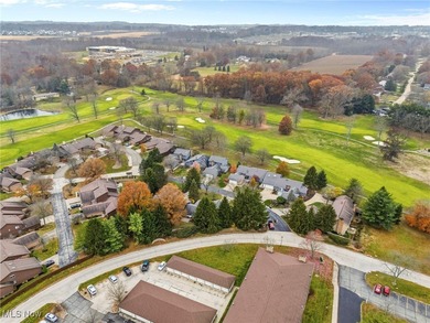 Discover effortless comfort in this charming condominium on Mayfair Country Club in Ohio - for sale on GolfHomes.com, golf home, golf lot