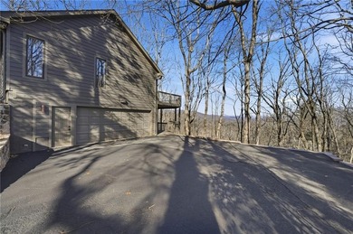 Enjoy breathtaking, long-range Blue Ridge Mountain views from on Big Canoe Golf Club - Cherokee in Georgia - for sale on GolfHomes.com, golf home, golf lot
