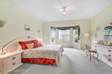Viera East Golf Course Beauty! LIVE the easy lifestyle in this on  in Florida - for sale on GolfHomes.com, golf home, golf lot