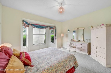 Viera East Golf Course Beauty! LIVE the easy lifestyle in this on  in Florida - for sale on GolfHomes.com, golf home, golf lot