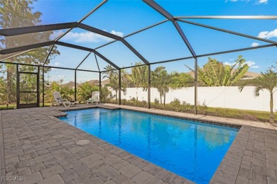 Pool Home Near Coral Oaks Golf Course featuring a great room on Burnt Store Golf Club in Florida - for sale on GolfHomes.com, golf home, golf lot